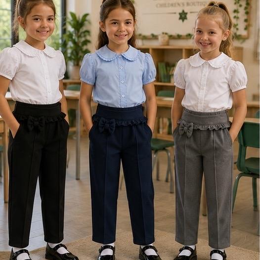 Ginger Ivy: CHESTER slim tapered style trousers with feature bow and ruffle trim